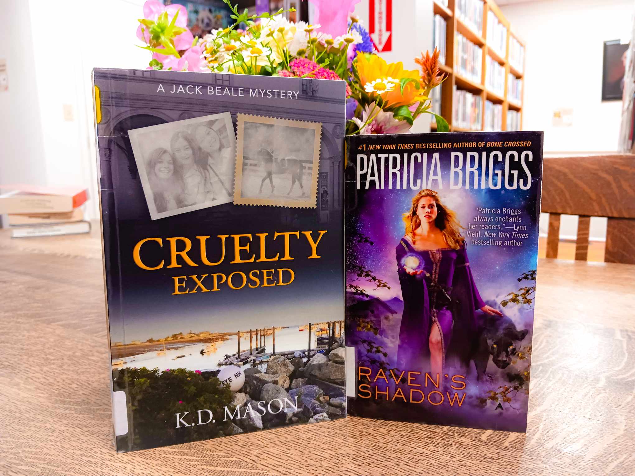 photograph of books - "Cruelty Exposed" and "Raven's Shadow"